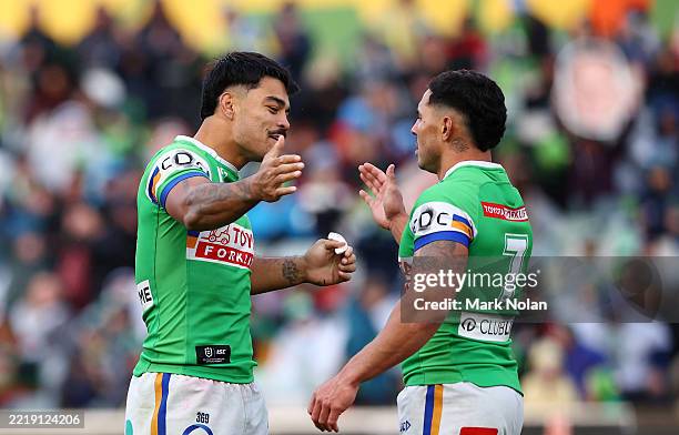 Nolan Stringer Matthew Timoko of the Raiders and team mate Jamal Fogarty celebrate ...