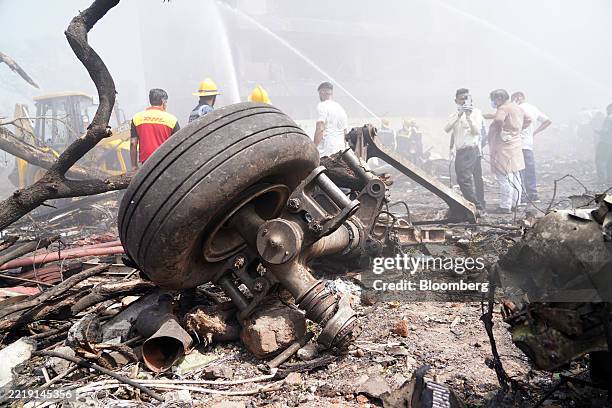 Aircraft landing gear at the crash site of Air India Ltd. Flight AI171 in Ahmedabad, Gujarat, India, on Thursday, June 12, 2025. An Air India Boeing...