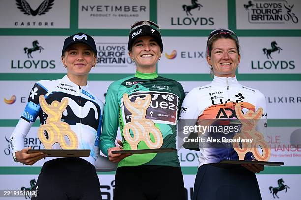 Cat Ferguson of Great Britain and Team Movistar on second place, race winner Ally Wollaston of New Zealand and Team FDJ - SUEZ - Green Leader Jersey...