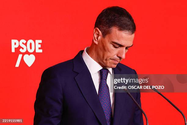 Spain's Prime Minister and ruling Socialist Party leader, Pedro Sanchez, looks down during a press conference at the PSOE headquarters in Madrid, on...