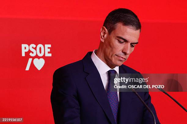 Spain's Prime Minister and ruling Socialist Party leader, Pedro Sanchez, looks down during a press conference at the PSOE headquarters in Madrid, on...