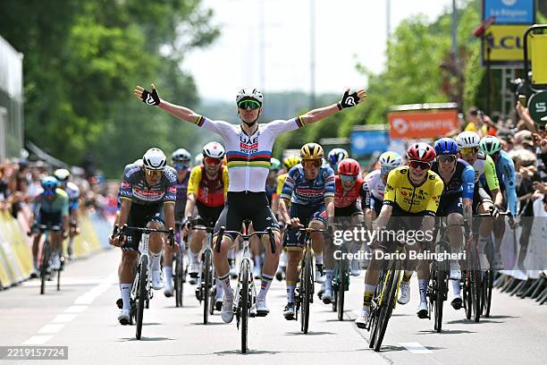 General view of Tadej Pogacar of Slovenia and UAE Team Emirates - XRG celebrates at finish line as stage winner ahead of Jonas Vingegaard of Denmark...