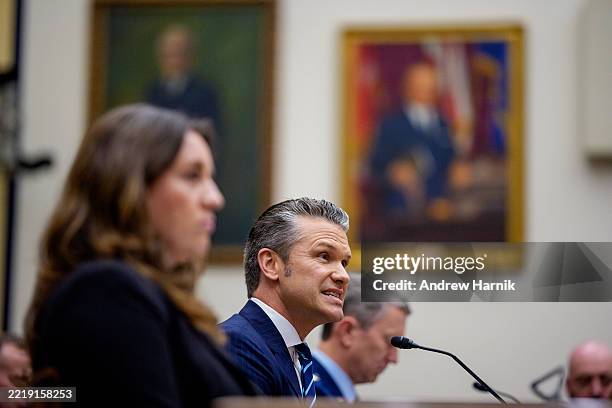 Defense Secretary Pete Hegseth , accompanied by acting Pentagon Comptroller Bryn MacDonnell , and Chairman of the Joint Chiefs of Staff Air Force...