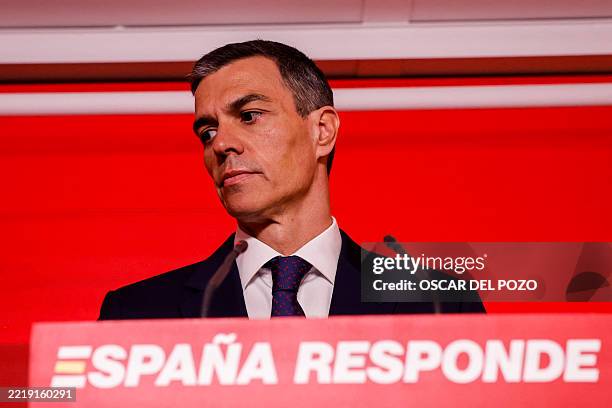 Spain's Prime Minister and ruling Socialist Party leader, Pedro Sanchez, looks on during a press conference at the PSOE headquarters in Madrid, on...