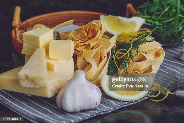 ingredients of lemon-garlic tagliatelle - dill stock pictures, royalty-free photos & images
