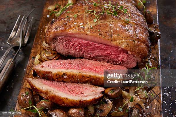 succulent medium rare beef picanha roast - bison meat stock pictures, royalty-free photos & images