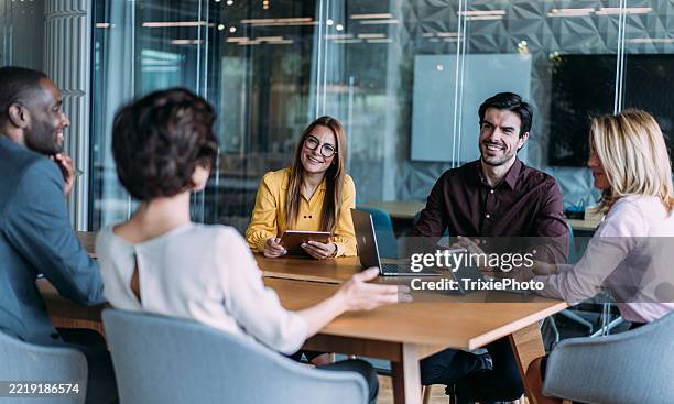 business persons on meeting in the office. - human resources stock pictures, royalty-free photos & images