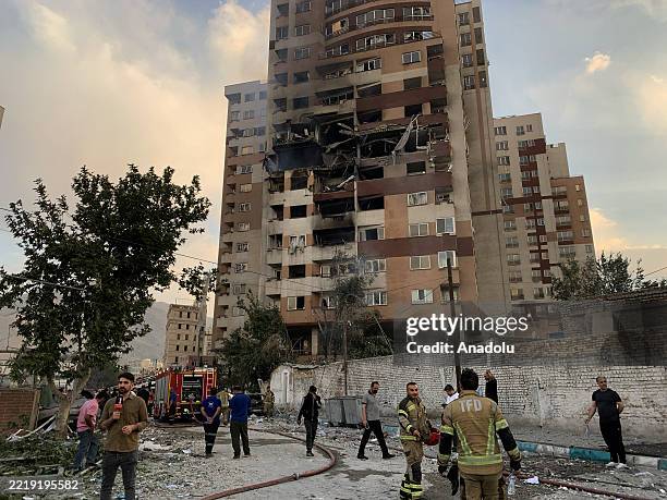View of a damaged building in the Iranian capital, Tehran, following an attack, on June 13, 2025. Israeli Defense Minister Israel Katz has announced...