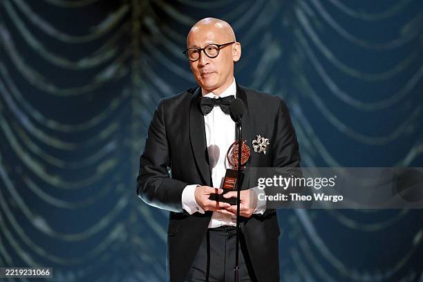 Francis Jue accepts the Best Performance by a Featured Actor in a Play award for "Yellow Face" onstage during The 78th Annual Tony Awards at Radio...