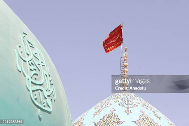 Red "flag of revenge" is seen raised atop the dome of the Jamkaran Mosque in Qom, Iran, on June 13 following Israeli attacks on multiple Iranian...