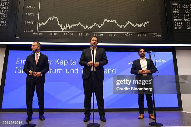 Stephan Leithner, chief executive officer of Deutsche Boerse AG, Lars Klingbeil, Germany's finance minister, and Kaweh Mansoori, deputy prime...