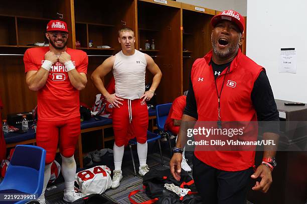 Interim head coach Shannon Harris of the the DC Defenders celebrates in the locker room after his team defeated the St. Louis Battlehawks at The Dome...