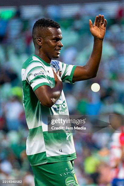 Darwin Quintero of Santos celebrates after scoring the team's third goal during a tribute match to honor former Mexican player Oswaldo Sanchez at...