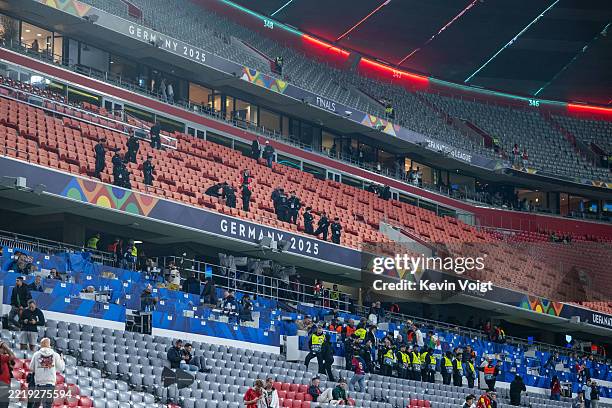 Police and Medical Service is seen on the Grandstand after the UEFA Nations League 2025 final match between Portugal and Spain at Munich Football...