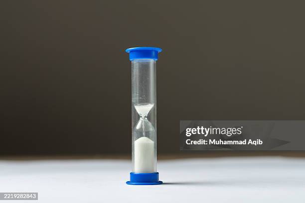 hourglass: the flow of time and transient moments - simple flow chart stock pictures, royalty-free photos & images
