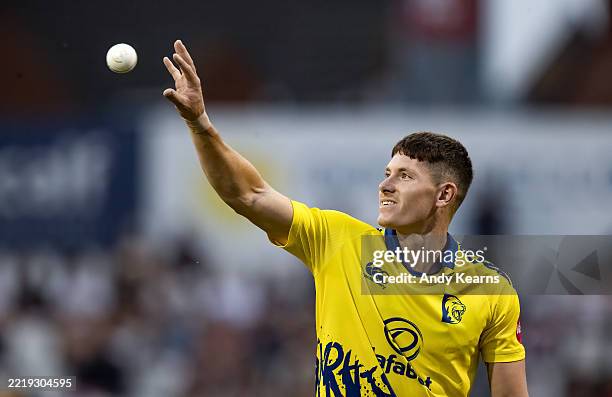 Matthew Potts of Durham Cricket keeps his eye on the ball during the Vitality Blast Men's match between Northamptonshire Steelbacks and Durham...