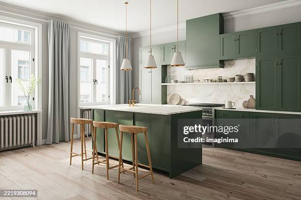modern kitchen interior with green cabinets and large island - kitchen bildbanksfoton och bilder