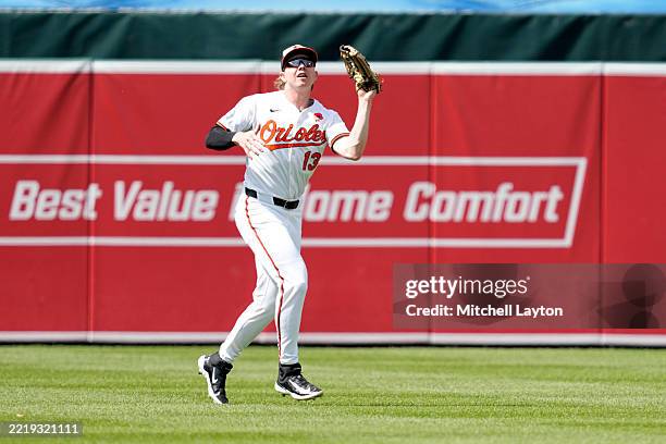 Kjerstad Heston Kjerstad of the Baltimore Orioles catches a fly ball during a ...