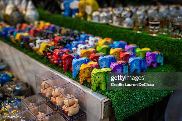 Elephant souvenirs are sold at the Bang Bao Pier and Fisherman's village on June 09, 2025 in Koh Chang, Thailand. Koh Chang, which means “Elephant...