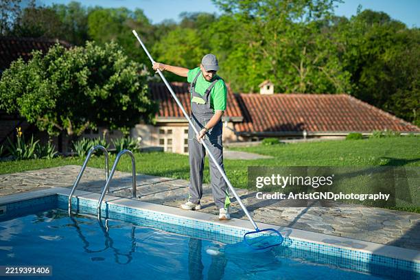 Pool Cleaner Job 876 Pool Cleaner Stock Photos, High-Res Pictures, and Images - Getty Images