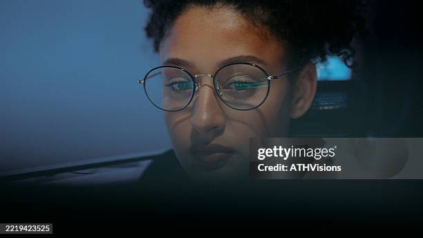 hispanic woman software developer working late in technology office - computer data error stock pictures, royalty-free photos & images