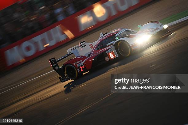 Porsche Penske Motorsport's Australian driver Matt Campbell steers his hypercar during the 2025 Le Mans 24 hour endurance race, at the Le Mans...