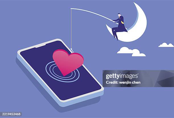 geschäftsmann, der auf dem mond sitzt und die herzform im handy mit einer angelrute herausfischt, emotionale online-täuschung - verführung stock-grafiken, -clipart, -cartoons und -symbole