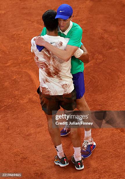 Carlos Alcaraz of Spain is congratulated by Jannik Sinner of Italy after the Men’s Singles Final match on Day Fifteen of the 2025 French Open at...
