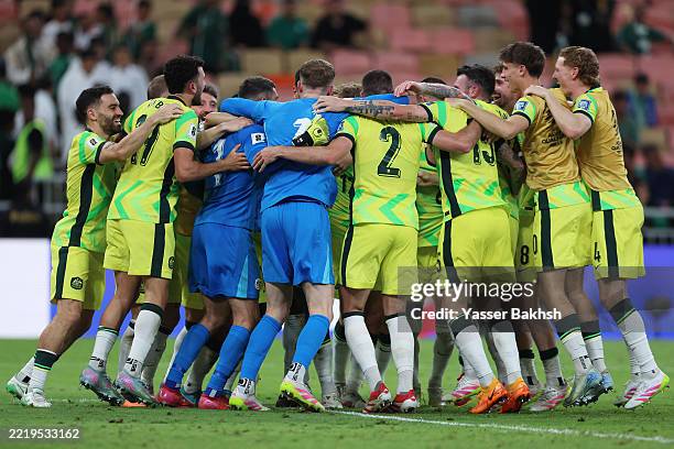 Players of Australia celebrate victory and subsequent qualification for the 2026 World Cup following the 2026 FIFA World Cup Round Three AFC Asian...