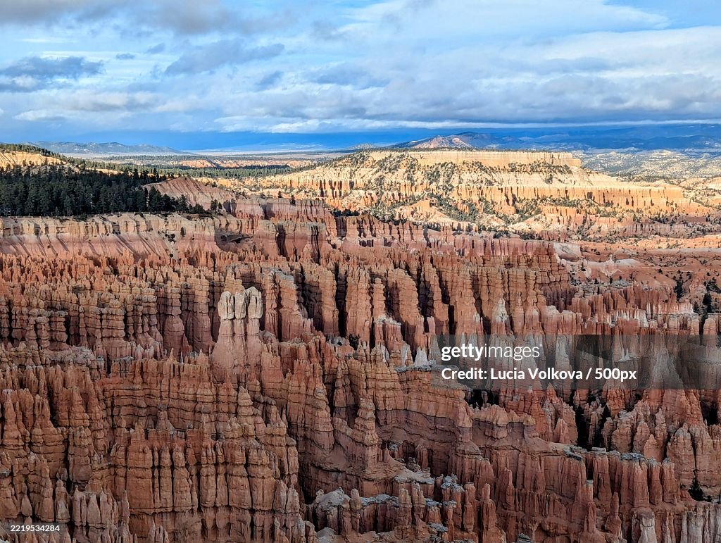 View of rock formations against cloudy sky,Garfield County,Utah,United States,USA
