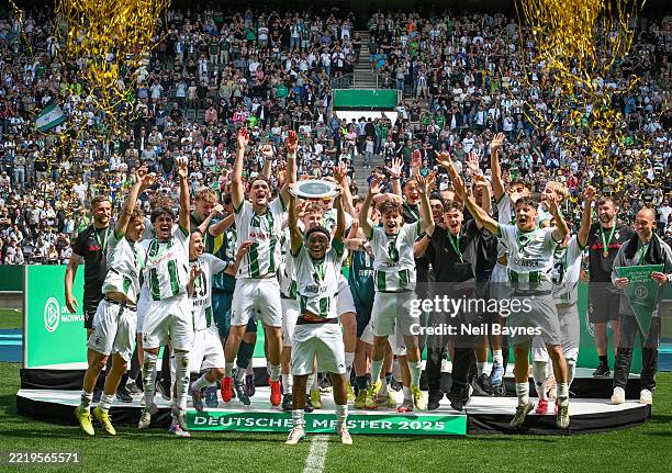 The Borussia Moenchengladbach team celebrates a 3-1 victory at the end of the DFB U17 Youth League Final between Borussia Mnchengladbach U17 and RB...