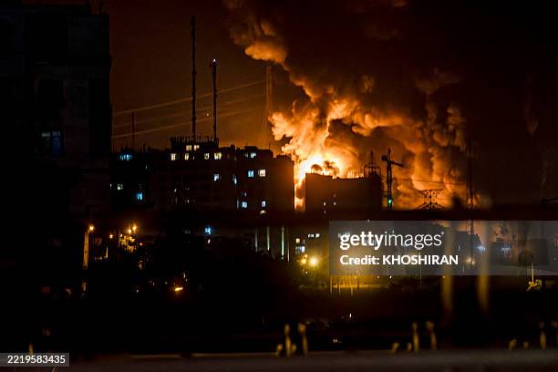 Somek rises as a location targeted by Israel is ablaze in Tehran amid the third day of Israel's waves of strikes against Iran, on Sunday, June 15,...