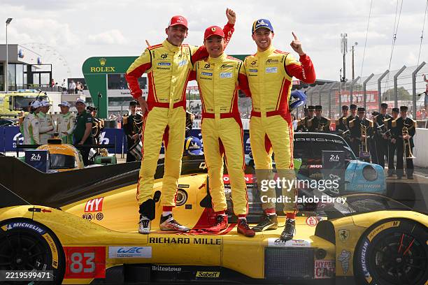 Ferrari AF Corse Ferrari 499P of Robert Kubica, Yifei Ye and Philip Hanson celebrate wininng the Le Mans 24 Hours race at the Circuit de la Sarthe on...