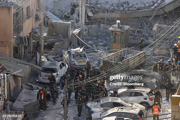 Rescue forces at the site of ballistic missile strike in Tel Aviv, Israel, on Monday, June 16, 2025. Iran fired several waves of drones and missiles...