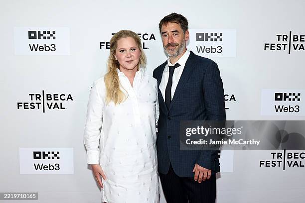Amy Schumer and Chris Fischer attend the "Room To Move" premiere during the 2025 Tribeca Festival at SVA Theater on June 11, 2025 in New York City.