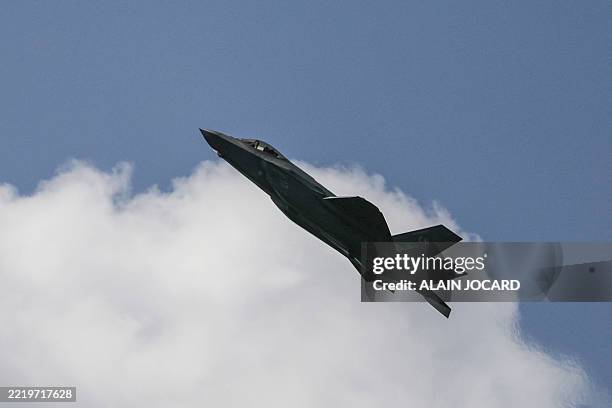 Air Force Lockheed Martin F-35 fighter jet performs during an exhibition flight as part of the 55th edition of the International Paris Air Show at...