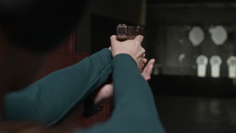 https://media.gettyimages.com/id/2219718199/video/trainee-aiming-pistol-while-instructor-correcting-her-stance-in-range.jpg?b=1&s=640x640&k=20&c=wasdgTvYktJovQY0v0-I-i4PG0BIVCGNDjPnieEckeA=