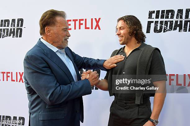 Arnold Schwarzenegger and Joseph Baena attend Netflix's Los Angeles premiere of "Fubar" Season 2 at Netflix Tudum Theater on June 11, 2025 in Los...