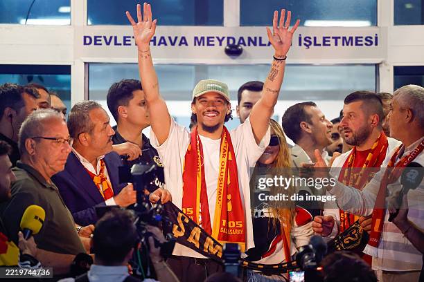 Galatasaray fans welcome German winger Leroy Sané with chants upon his arrival at Atatürk Airport in Istanbul, Türkiye, following his transfer to the...