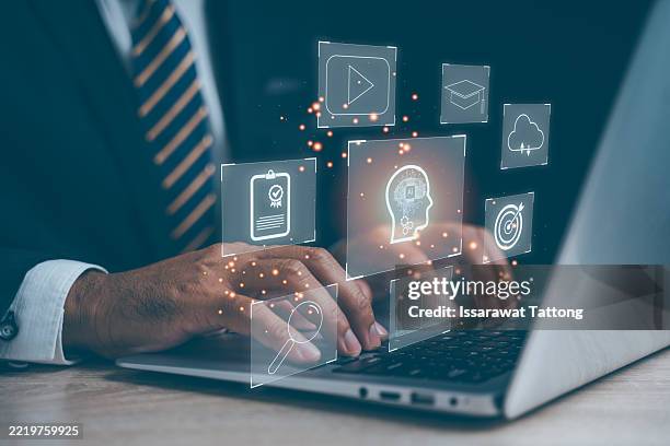 elearning technology webinar education training captured in modern workspace with laptop and tablet showcasing remote courses and interactive modules for personalized growth, - virtual library stock pictures, royalty-free photos & images