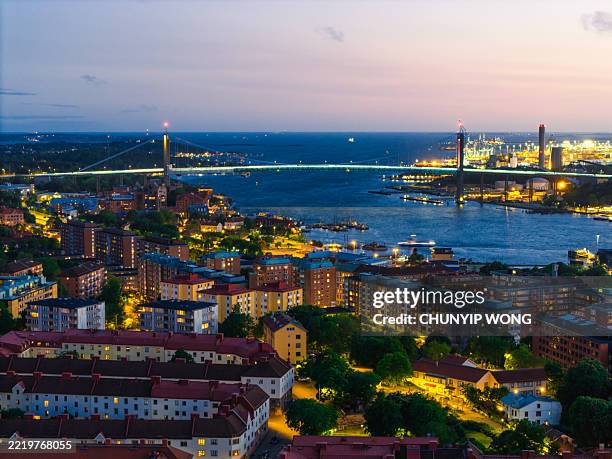 gothenburg cityscape with älvsborg bridge at dusk, sweden - göteborg stad bildbanksfoton och bilder