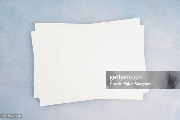 top view blank white paper a4 size on wooden background. - a4 paper stock pictures, royalty-free photos & images