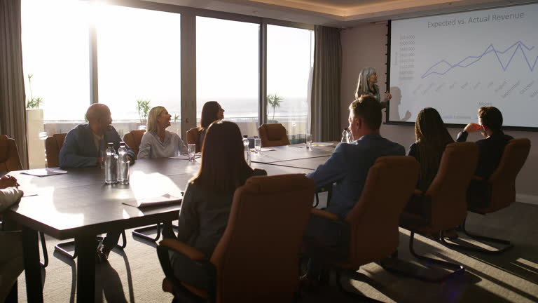 https://media.gettyimages.com/id/2219785261/video/presentation-meeting-and-chart-with-business-woman-in-office-for-revenue-shareholder-and.jpg?b=1&s=640x640&k=20&c=hLl_Ve-z9-mUJVS1FBpDQ4g4GoHasgVzp4ZSQQrGaDg=