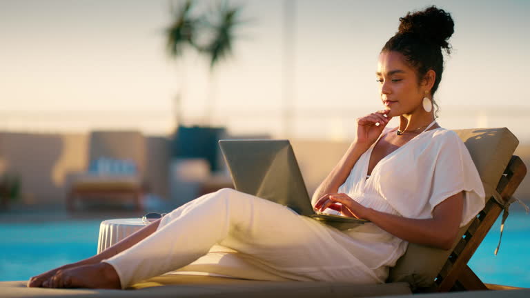 https://media.gettyimages.com/id/2219806859/video/laptop-smile-and-thinking-with-woman-at-swimming-pool-of-hotel-to-post-article-for-travel.jpg?b=1&s=640x640&k=20&c=AArh43egVHsybSZ0H0cgdSFRlxzrZ3F9yr1uokt_BEg=