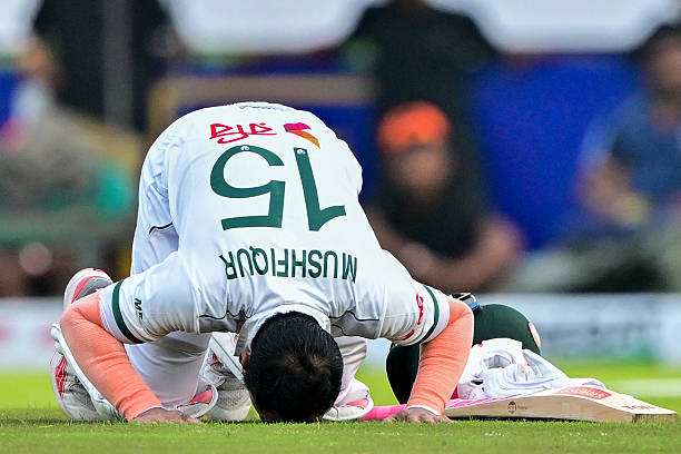 Bangladesh's Mushfiqur Rahim celebrates after scoring a century during the first day of the first Test cricket match between Sri Lanka and Bangladesh...
