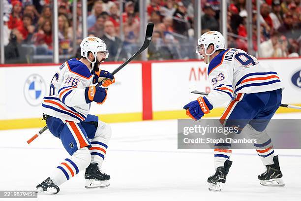 Jake Walman of the Edmonton Oilers celebrates with Ryan Nugent-Hopkins after Walman scored a goal during the third period against the Florida...
