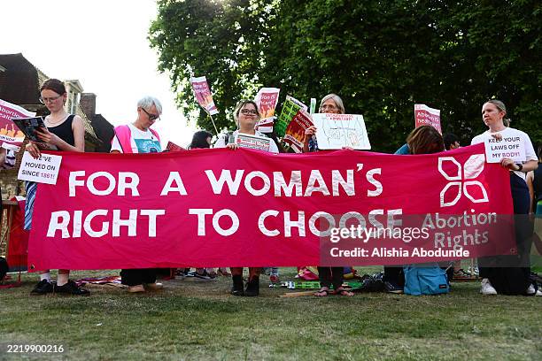 Protesters from pro-choice group 'Abortion Rights' gather near Parliament, where MPs are voting on the decriminalisation of abortion on June 17, 2025...