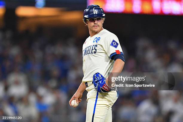 Los Angeles Dodgers infielder Enrique Hernandez looks on before throwing a pitch during the MLB game between the San Francisco Giants and the Los...