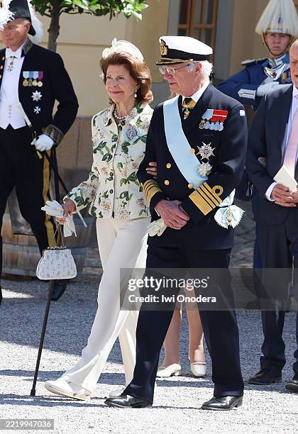 Queen Silvia of Sweden and King Carl XVI Gustaf of Sweden leave after the christening of Princess Ines of Sweden at the Drottningholm Palace Chapel...