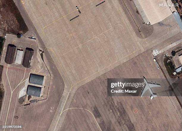 Maxar Satellite Imagery shows a KC-707 refueling tanker aircraft parked at Mashhad Airport prior to being struck. Location: 36.251, 59.628. Please...